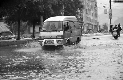 榕江縣為環保建水路車輛進城先洗輪胎(圖)